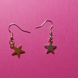 Star earrings 1 gold 1 silver